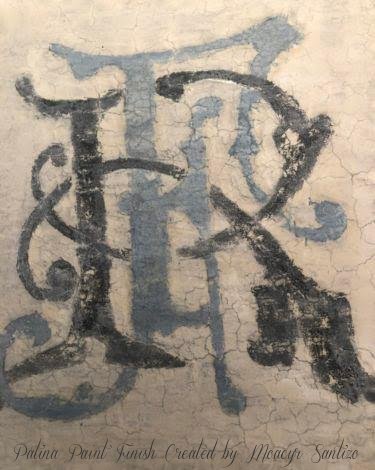 Blue painted patina monogram by FARRAGOZ student