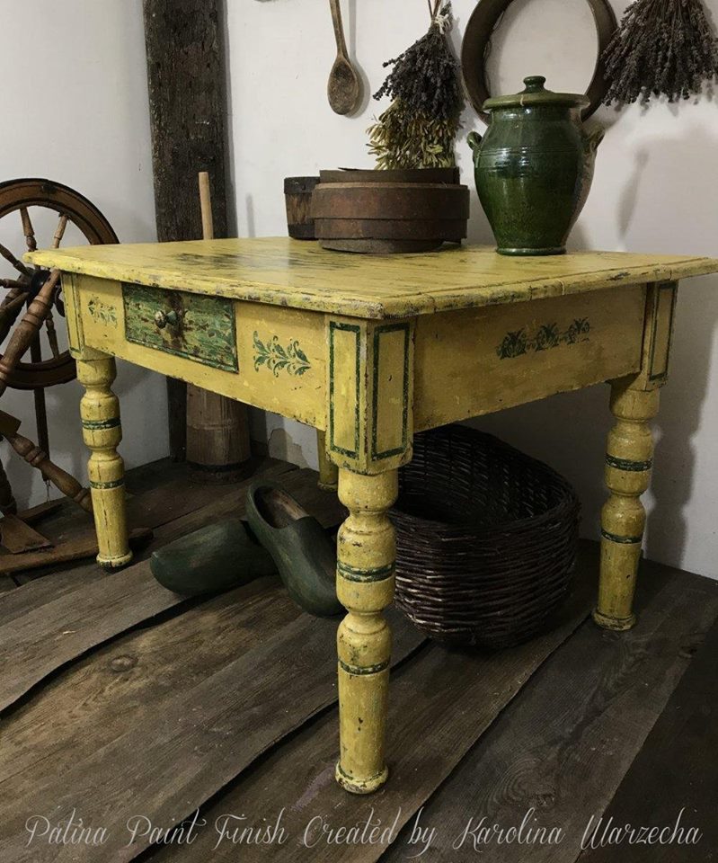 Yellow ochre patina painted table with green detail painted by a student