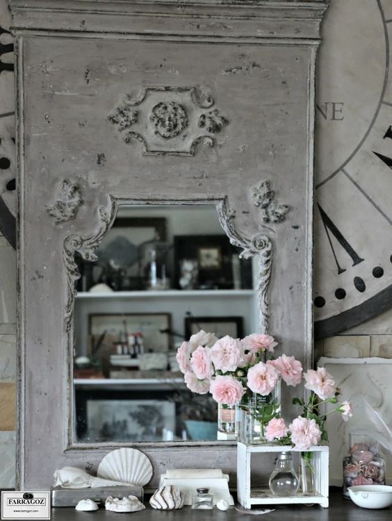Grey and taupe handmade trumeau mirror and large clock face made using traditional paint recipes.